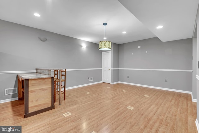 8139 Showcase Ct, Pasadena, MD 21122 - spare room with light wood-type flooring, baseboards, and recessed lighting