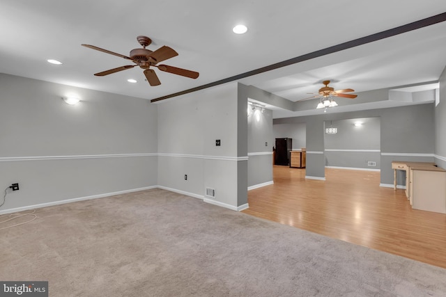 8139 Showcase Ct, Pasadena, MD 21122 - unfurnished living room with ceiling fan, carpet, recessed lighting, baseboards, and wood finished floors