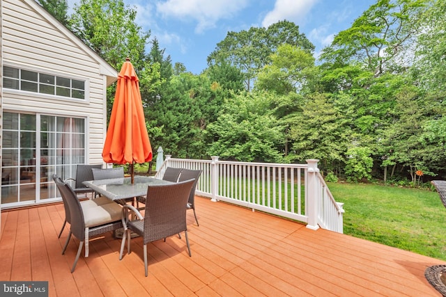 8139 Showcase Ct, Pasadena, MD 21122 - deck with a lawn, outdoor dining space, and view of scattered trees