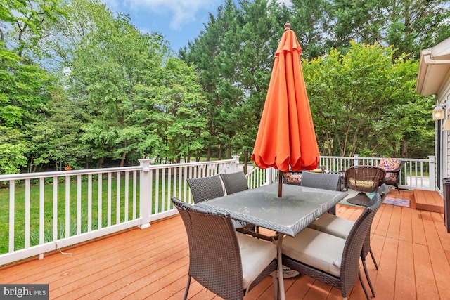 8139 Showcase Ct, Pasadena, MD 21122 - wooden terrace featuring outdoor dining space and a lawn