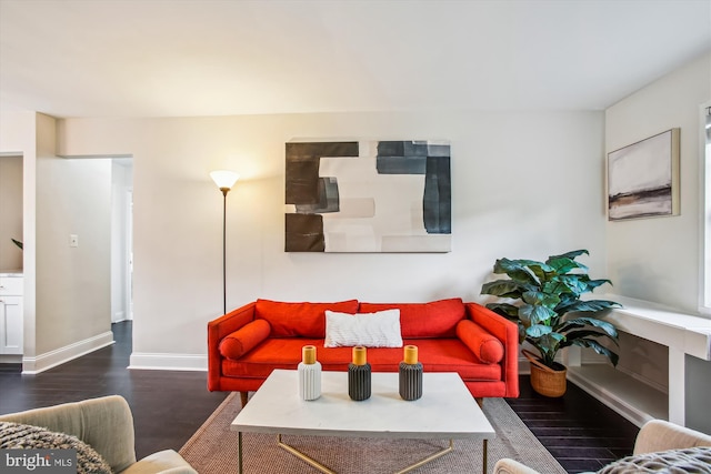 1712 W Abingdon Dr Unit 102, Alexandria, VA 22314 - living room with wood finished floors and baseboards