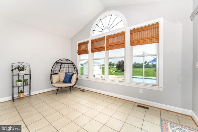 301 Nottingham Ln, Queenstown, MD 21658 - unfurnished room with healthy amount of natural light, light tile patterned flooring, and high vaulted ceiling