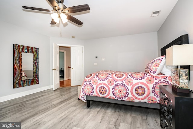 301 Nottingham Ln, Queenstown, MD 21658 - bedroom featuring wood finished floors and a ceiling fan