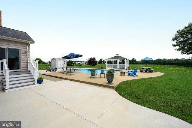 301 Nottingham Ln, Queenstown, MD 21658 - swimming pool with a gazebo, a shed, a patio area, and a lawn