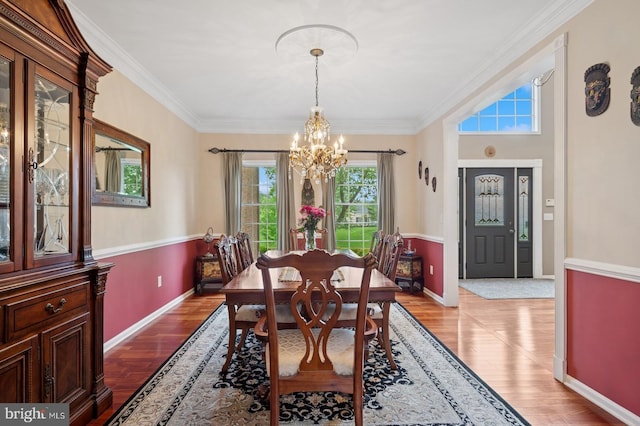 56 Saxon Way, Skillman, NJ 08558 - dining space featuring a chandelier, plenty of natural light, light wood-style floors, and crown molding