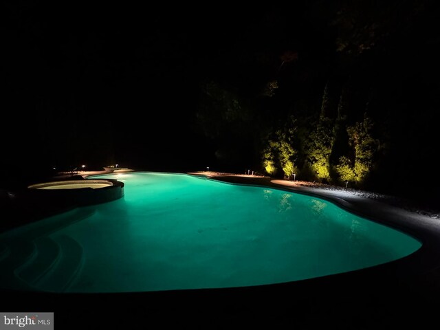 56 Saxon Way, Skillman, NJ 08558 - pool at twilight with an outdoor pool