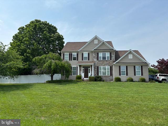 view of front of house with stone siding