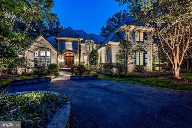 601 Utterback Store Rd, Great Falls, VA 22066 - french country inspired facade with stone siding and brick siding