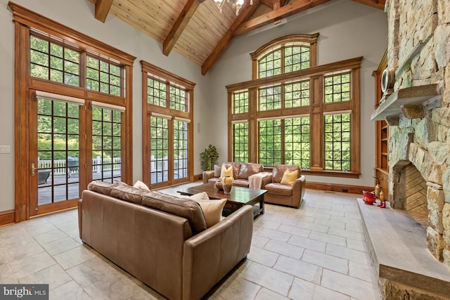 601 Utterback Store Rd, Great Falls, VA 22066 - living area with high vaulted ceiling, beamed ceiling, wood ceiling, light tile patterned flooring, and a stone fireplace