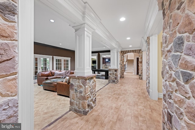 601 Utterback Store Rd, Great Falls, VA 22066 - hallway with ornate columns, crown molding, arched walkways, wood finished floors, and recessed lighting