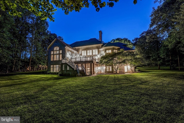 601 Utterback Store Rd, Great Falls, VA 22066 - rear view of property with stairs, a lawn, and a wooden deck