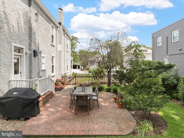 19 E Del Ray Ave E, Alexandria, VA 22301 - view of patio with a grill, outdoor dining space, and a residential view