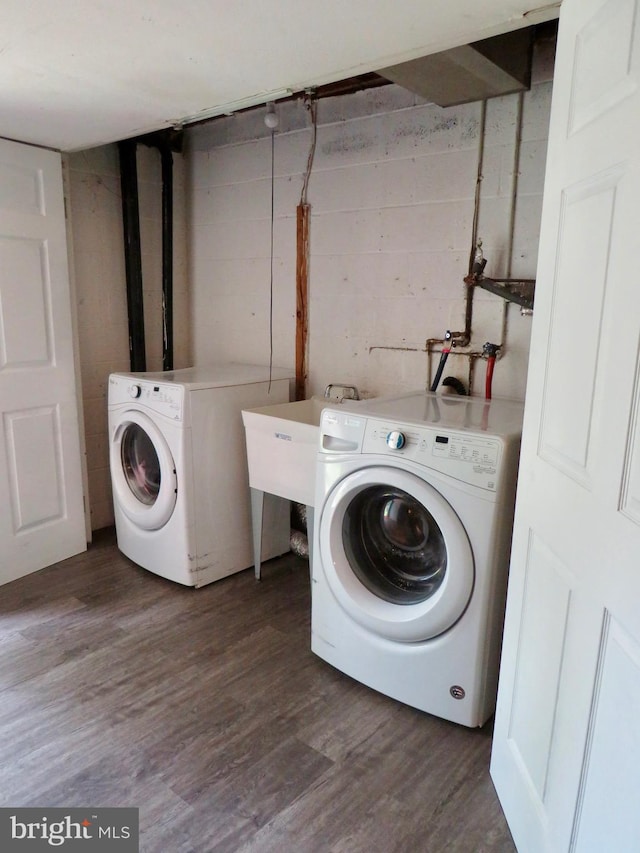 494 Kenilworth Ct, Glen Burnie, MD 21061 - washroom featuring washer / dryer and wood finished floors