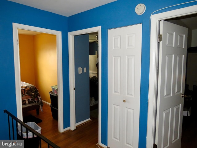494 Kenilworth Ct, Glen Burnie, MD 21061 - bedroom featuring dark wood-type flooring, baseboards, and a closet