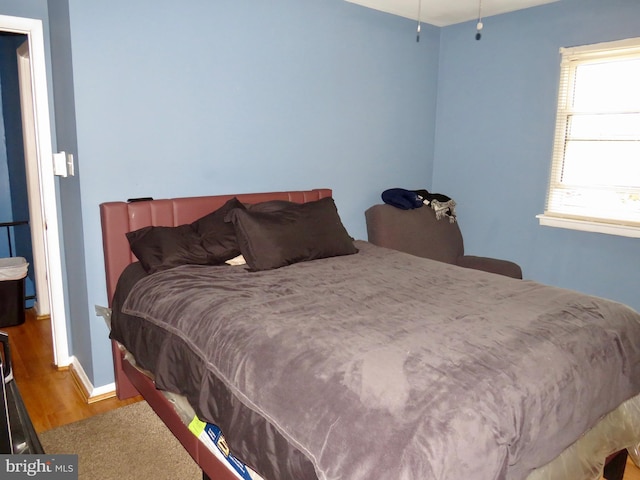 494 Kenilworth Ct, Glen Burnie, MD 21061 - bedroom featuring wood finished floors and baseboards