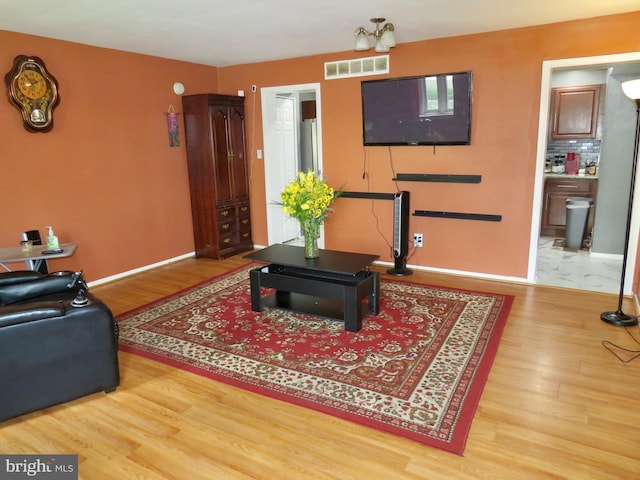 494 Kenilworth Ct, Glen Burnie, MD 21061 - living room featuring wood finished floors and baseboards