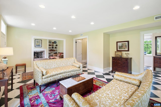 3276 Buckingham Springs Rd, Dillwyn, VA 23936 - living room featuring baseboards, recessed lighting, tile patterned floors, and a fireplace