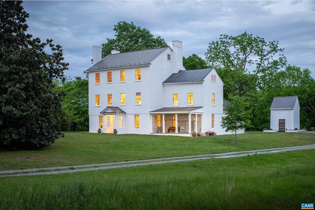 3276 Buckingham Springs Rd, Dillwyn, VA 23936 - view of front of house with a chimney, a standing seam roof, and metal roof