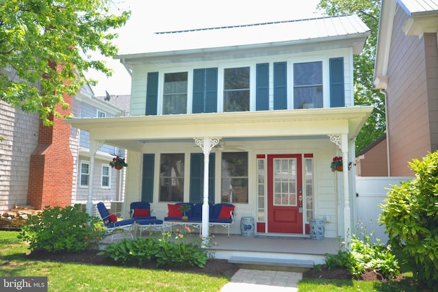 204 W Chew Ave, Saint Michaels, MD 21663 - view of front of house featuring covered porch and fence