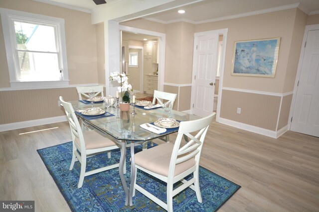 204 W Chew Ave, Saint Michaels, MD 21663 - dining space featuring wainscoting, light wood-style floors, healthy amount of natural light, crown molding, and recessed lighting
