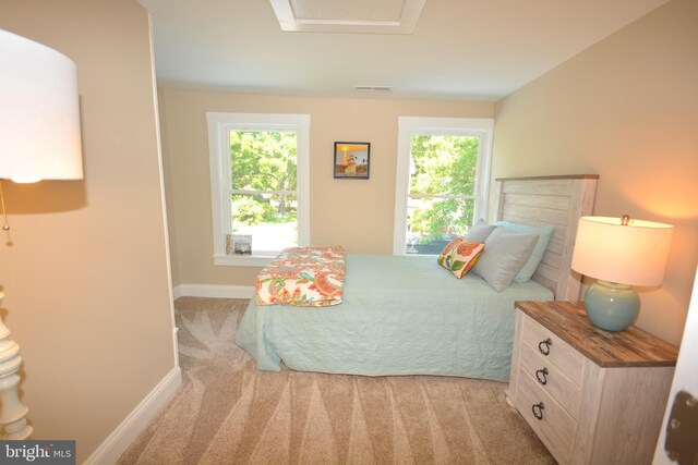 204 W Chew Ave, Saint Michaels, MD 21663 - bedroom featuring baseboards and light carpet