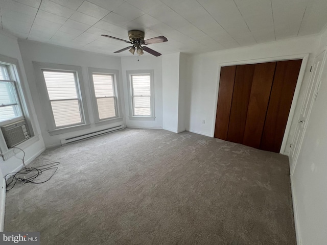 19 S Gold St, Shamokin, PA 17872 - unfurnished living room featuring baseboard heating, carpet floors, ceiling fan, and baseboards