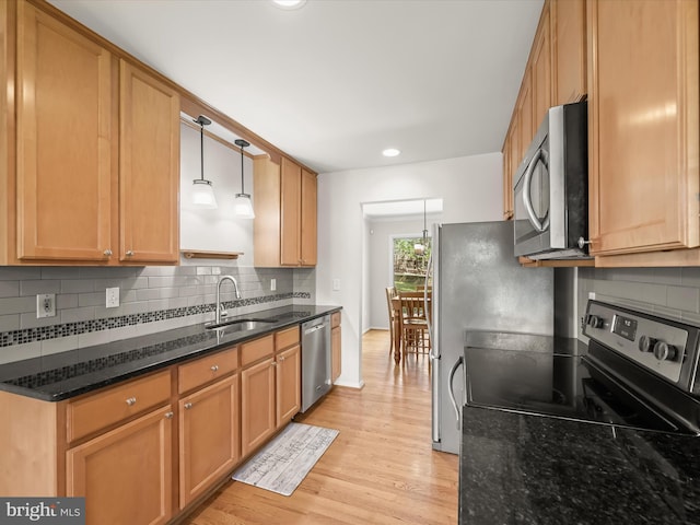 25109 Hickory Ridge Ln, Gaithersburg, MD 20882 - kitchen with appliances with stainless steel finishes, light wood-style flooring, decorative backsplash, and recessed lighting
