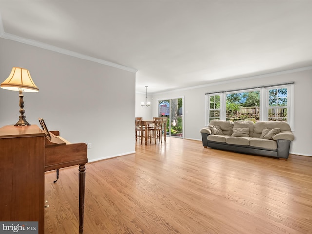 25109 Hickory Ridge Ln, Gaithersburg, MD 20882 - living area featuring wood finished floors, ornamental molding, and a chandelier
