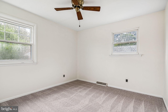 21 Princeton Ave, Gloucester City, NJ 08030 - empty room featuring healthy amount of natural light, carpet flooring, baseboards, and ceiling fan