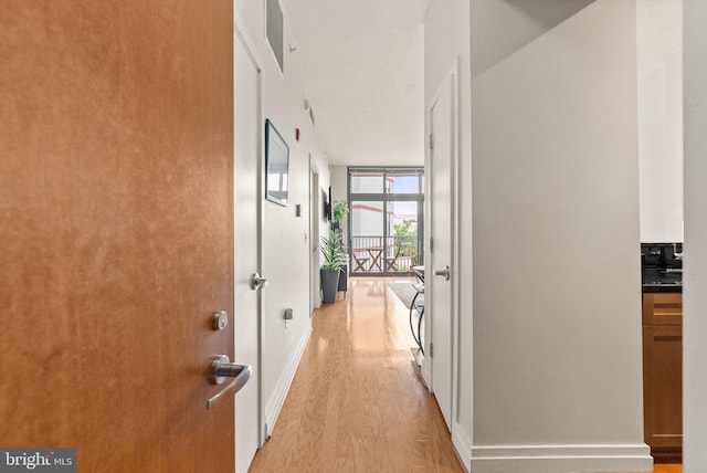 2120 Vermont Ave NW Unit 411, Washington, DC 20001 - corridor featuring light wood-style flooring and baseboards