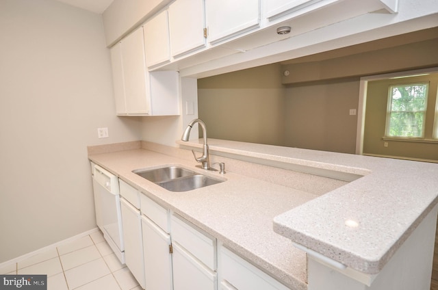 3313 Wyndham Cir Unit 4209, Alexandria, VA 22302 - kitchen featuring a sink, dishwasher, baseboards, light tile patterned floors, and white cabinets