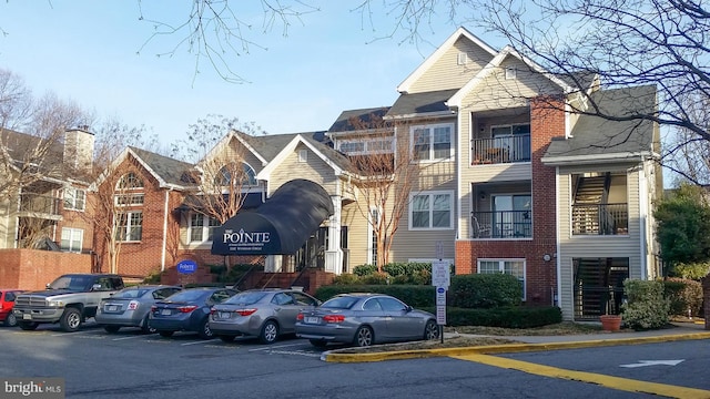 3313 Wyndham Cir Unit 4209, Alexandria, VA 22302 - view of property with uncovered parking