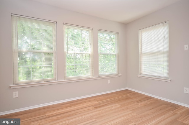 3313 Wyndham Cir Unit 4209, Alexandria, VA 22302 - unfurnished room featuring light wood-style flooring and baseboards