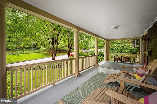 109 Deepdene Rd, Baltimore, MD 21210 - wooden porch featuring a yard