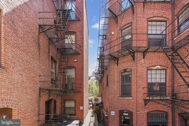 view of building exterior featuring a cooling unit