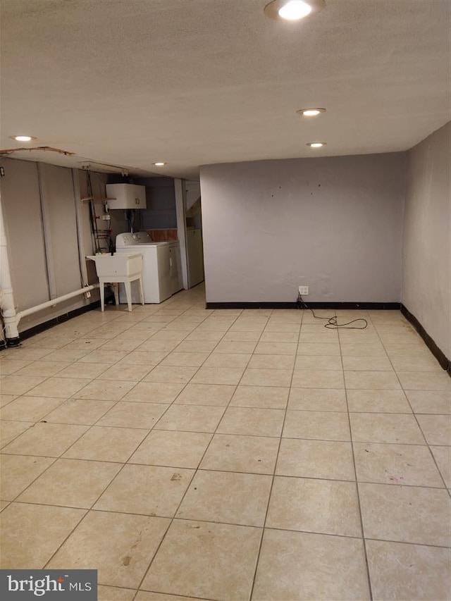 3138 Longshore Ave, Philadelphia, PA 19149 - kitchen with recessed lighting, independent washer and dryer, a sink, baseboards, and light tile patterned floors