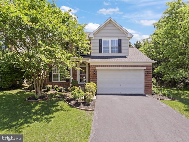 view of front of home with asphalt driveway, brick siding, a front yard, an attached garage, and a shingled roof