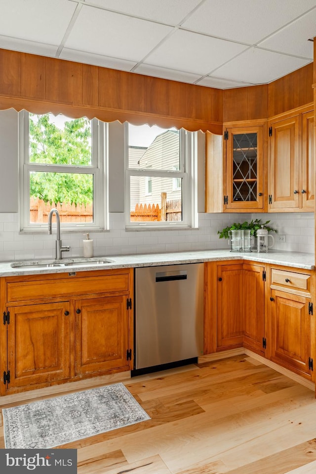308 Cherry St, Columbia, PA 17512 - kitchen with stainless steel dishwasher, a sink, light countertops, backsplash, and a drop ceiling