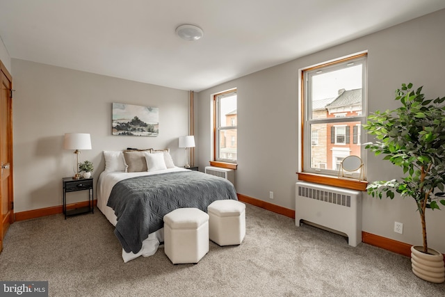 308 Cherry St, Columbia, PA 17512 - bedroom with radiator heating unit, baseboards, and light colored carpet