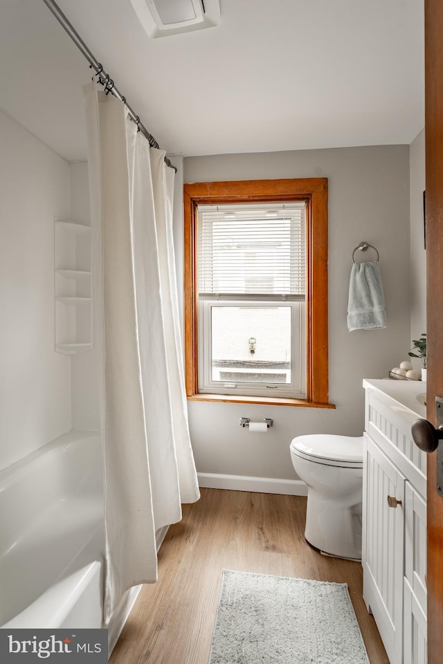 308 Cherry St, Columbia, PA 17512 - bathroom with toilet, wood finished floors, baseboards, and vanity
