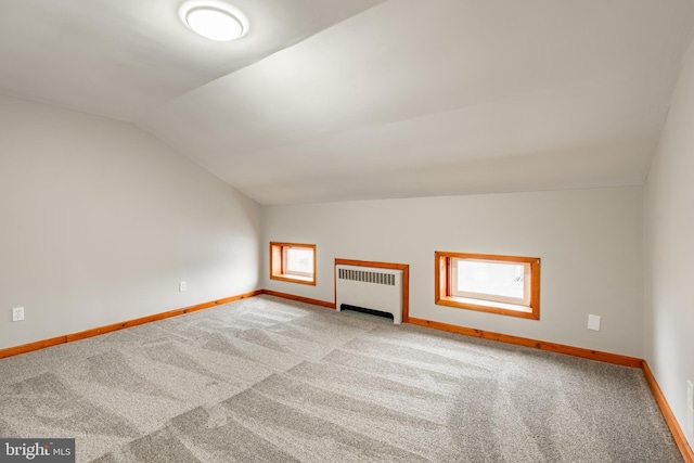 308 Cherry St, Columbia, PA 17512 - bonus room with radiator, vaulted ceiling, carpet, and baseboards
