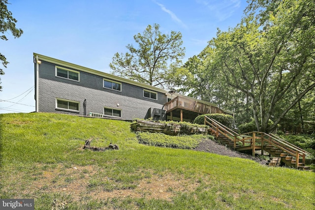 3503 Arborwood Ct, Baltimore, MD 21208 - rear view of property featuring stairs, a deck, a yard, and brick siding