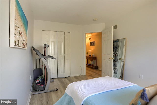 1328 N W St, Carlisle, PA 17013 - bedroom with wood finished floors, a closet, and baseboards