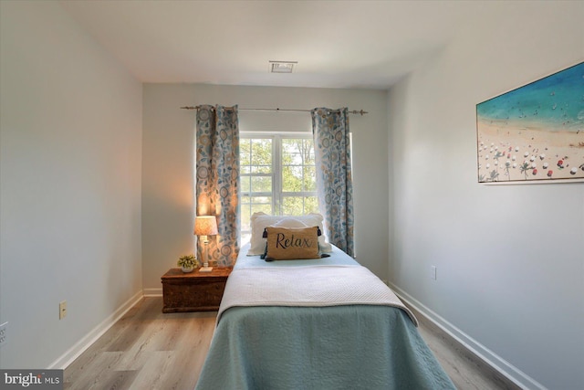 1328 N W St, Carlisle, PA 17013 - bedroom featuring wood finished floors and baseboards