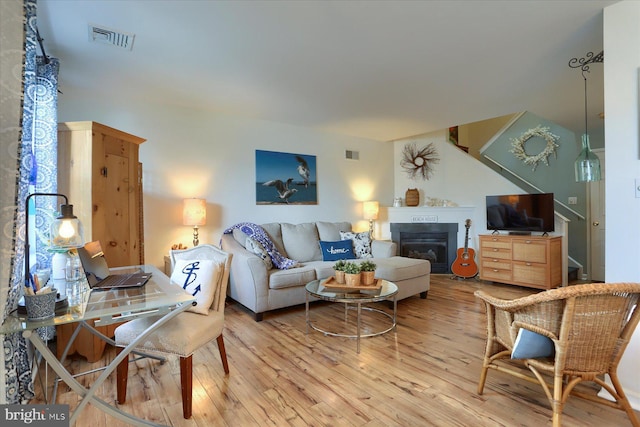 1328 N W St, Carlisle, PA 17013 - living area featuring hardwood / wood-style floors and a glass covered fireplace