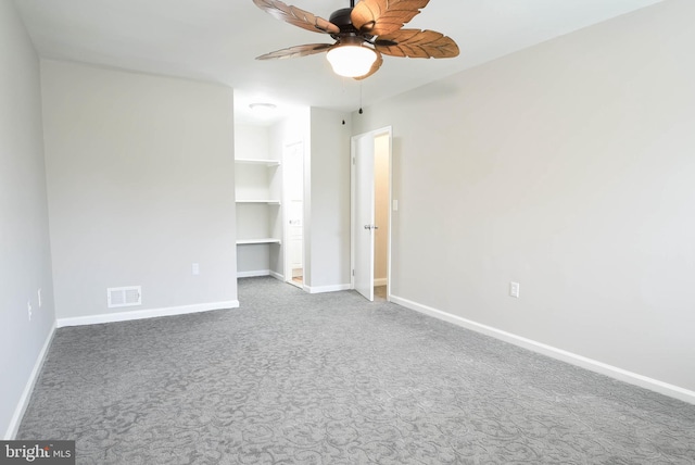 8514 Magnolia Dr, Lanham, MD 20706 - spare room featuring ceiling fan, carpet flooring, and baseboards
