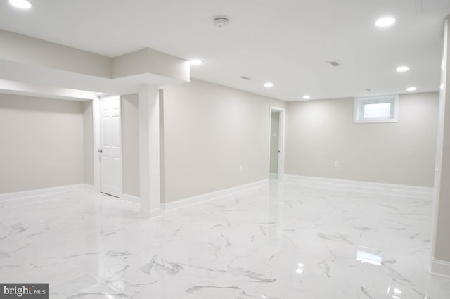 8514 Magnolia Dr, Lanham, MD 20706 - basement with recessed lighting, light marble finish flooring, and baseboards