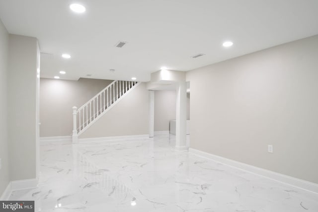 8514 Magnolia Dr, Lanham, MD 20706 - empty room with recessed lighting, marble finish floors, baseboards, and stairway