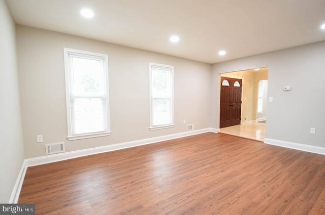 8514 Magnolia Dr, Lanham, MD 20706 - entrance foyer featuring wood finished floors, recessed lighting, baseboards, and plenty of natural light