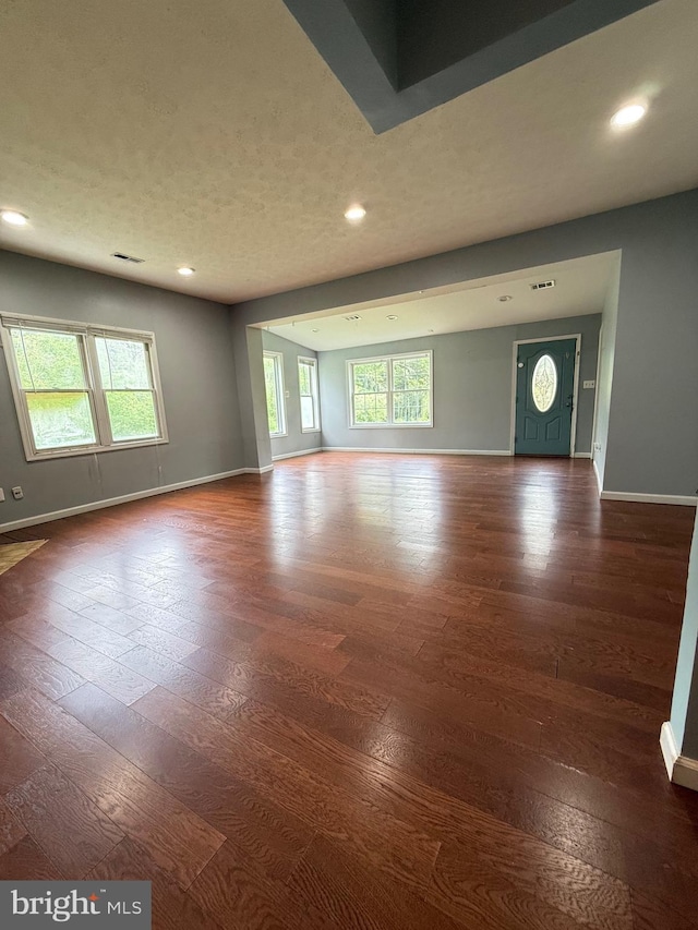 7421 Lake Dr, Manassas, VA 20111 - spare room with baseboards, recessed lighting, and dark wood-style flooring